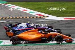 Fernando Alonso (ESP) McLaren MCL33 and Pierre Gasly (FRA) Scuderia Toro Rosso STR13 battle for position. 02.09.2018. Formula 1 World Championship, Rd 14, Italian Grand Prix, Monza, Italy, Race Day.