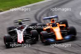 (L to R): Kevin Magnussen (DEN) Haas VF-18 and Fernando Alonso (ESP) McLaren MCL33. 01.09.2018. Formula 1 World Championship, Rd 14, Italian Grand Prix, Monza, Italy, Qualifying Day.