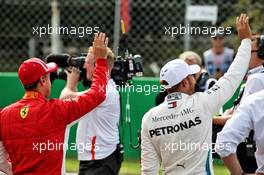 (L to R): Sebastian Vettel (GER) Ferrari and Lewis Hamilton (GBR) Mercedes AMG F1 in qualifying parc ferme. 01.09.2018. Formula 1 World Championship, Rd 14, Italian Grand Prix, Monza, Italy, Qualifying Day.