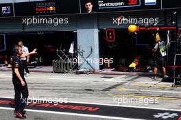 Red Bull Racing pit garages with Max Verstappen (NLD) Red Bull Racing RB14 about to leaves the pits. 01.09.2018. Formula 1 World Championship, Rd 14, Italian Grand Prix, Monza, Italy, Qualifying Day.