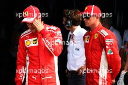 (L to R): Sebastian Vettel (GER) Ferrari with team mate and pole sitter Kimi Raikkonen (FIN) Ferrari in qualifying parc ferme. 01.09.2018. Formula 1 World Championship, Rd 14, Italian Grand Prix, Monza, Italy, Qualifying Day.