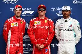 Qualifying top three in parc ferme (L to R): Sebastian Vettel (GER) Ferrari, second; Kimi Raikkonen (FIN) Ferrari, pole position; Lewis Hamilton (GBR) Mercedes AMG F1, third. 01.09.2018. Formula 1 World Championship, Rd 14, Italian Grand Prix, Monza, Italy, Qualifying Day.