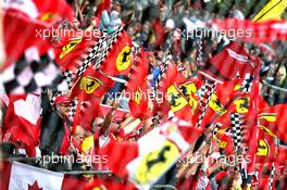 Ferrari fans celebrate pole position and second place in qualifying. 01.09.2018. Formula 1 World Championship, Rd 14, Italian Grand Prix, Monza, Italy, Qualifying Day.