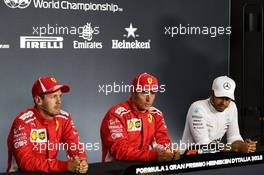 (L to R): Sebastian Vettel (GER) Ferrari; pole sitter Kimi Raikkonen (FIN) Ferrari; and Lewis Hamilton (GBR) Mercedes AMG F1, in the post qualifying FIA Press Conference. 01.09.2018. Formula 1 World Championship, Rd 14, Italian Grand Prix, Monza, Italy, Qualifying Day.
