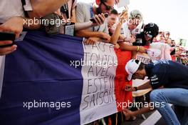 Esteban Ocon (FRA) Racing Point Force India F1 Team signs autographs for the fans. 30.08.2018. Formula 1 World Championship, Rd 14, Italian Grand Prix, Monza, Italy, Preparation Day.