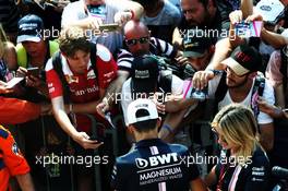 Esteban Ocon (FRA) Racing Point Force India F1 Team signs autographs for the fans. 30.08.2018. Formula 1 World Championship, Rd 14, Italian Grand Prix, Monza, Italy, Preparation Day.