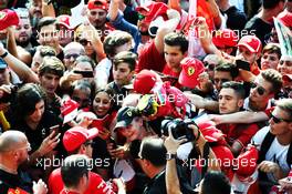 Sebastian Vettel (GER) Ferrari signs autographs for the fans. 30.08.2018. Formula 1 World Championship, Rd 14, Italian Grand Prix, Monza, Italy, Preparation Day.