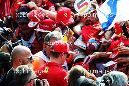Kimi Raikkonen (FIN) Ferrari signs autographs for the fans. 30.08.2018. Formula 1 World Championship, Rd 14, Italian Grand Prix, Monza, Italy, Preparation Day.