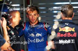 Pierre Gasly (FRA) Scuderia Toro Rosso STR13 in the Red Bull Racing pit garage. 30.08.2018. Formula 1 World Championship, Rd 14, Italian Grand Prix, Monza, Italy, Preparation Day.