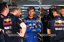 Pierre Gasly (FRA) Scuderia Toro Rosso STR13 in the Red Bull Racing pit garage. 30.08.2018. Formula 1 World Championship, Rd 14, Italian Grand Prix, Monza, Italy, Preparation Day.