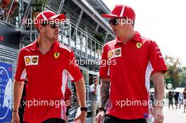 (L to R): Sebastian Vettel (GER) Ferrari with team mate Kimi Raikkonen (FIN) Ferrari. 30.08.2018. Formula 1 World Championship, Rd 14, Italian Grand Prix, Monza, Italy, Preparation Day.