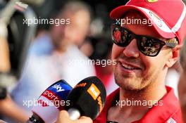 Sebastian Vettel (GER) Ferrari with the media. 30.08.2018. Formula 1 World Championship, Rd 14, Italian Grand Prix, Monza, Italy, Preparation Day.