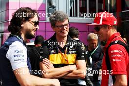 Chris Dyer (AUS) Renault Sport F1 Team Head of Vehicle Performance (Centre) with Kimi Raikkonen (FIN) Ferrari (Right). 30.08.2018. Formula 1 World Championship, Rd 14, Italian Grand Prix, Monza, Italy, Preparation Day.