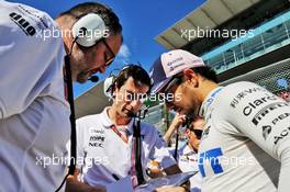 Sergio Perez (MEX) Racing Point Force India F1 Team with Tim Wright (GBR) Racing Point Force India F1 Team Race Engineer and Tom McCullough (GBR) Racing Point Force India F1 Team Chief Engineer. 07.10.2018. Formula 1 World Championship, Rd 17, Japanese Grand Prix, Suzuka, Japan, Race Day.