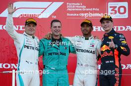 1st place Lewis Hamilton (GBR) Mercedes AMG F1 W09 with 2nd place Valtteri Bottas (FIN) Mercedes AMG F1 and 3rd place Max Verstappen (NLD) Red Bull Racing RB14. 07.10.2018. Formula 1 World Championship, Rd 17, Japanese Grand Prix, Suzuka, Japan, Race Day.
