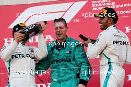 The podium (L to R): second placed Valtteri Bottas (FIN) Mercedes AMG F1 celebrates with Matt Deane (GBR) Mercedes AMG F1 Race Engineer and race winner Lewis Hamilton (GBR) Mercedes AMG F1. 07.10.2018. Formula 1 World Championship, Rd 17, Japanese Grand Prix, Suzuka, Japan, Race Day.