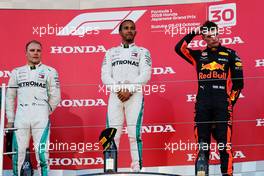The podium (L to R): Valtteri Bottas (FIN) Mercedes AMG F1, second; Lewis Hamilton (GBR) Mercedes AMG F1, race winner; Max Verstappen (NLD) Red Bull Racing, third. 07.10.2018. Formula 1 World Championship, Rd 17, Japanese Grand Prix, Suzuka, Japan, Race Day.