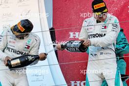 The podium (L to R): Race winner Lewis Hamilton (GBR) Mercedes AMG F1 celebrates with second placed team mate Valtteri Bottas (FIN) Mercedes AMG F1. 07.10.2018. Formula 1 World Championship, Rd 17, Japanese Grand Prix, Suzuka, Japan, Race Day.