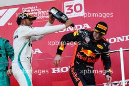 The podium (L to R): Race winner Lewis Hamilton (GBR) Mercedes AMG F1 celebrates with third placed Max Verstappen (NLD) Red Bull Racing. 07.10.2018. Formula 1 World Championship, Rd 17, Japanese Grand Prix, Suzuka, Japan, Race Day.