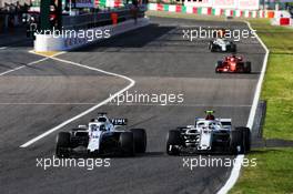 (L to R): Lance Stroll (CDN) Williams FW41 and Charles Leclerc (MON) Sauber F1 Team C37 battle for position. 07.10.2018. Formula 1 World Championship, Rd 17, Japanese Grand Prix, Suzuka, Japan, Race Day.