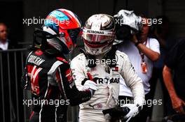 Lewis Hamilton (GBR) Mercedes AMG F1 celebrates his qualifying parc ferme with Romain Grosjean (FRA) Haas F1 Team. 06.10.2018. Formula 1 World Championship, Rd 17, Japanese Grand Prix, Suzuka, Japan, Qualifying Day.