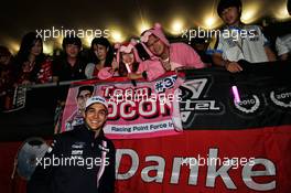 Esteban Ocon (FRA) Racing Point Force India F1 Team with the fans at night time. 06.10.2018. Formula 1 World Championship, Rd 17, Japanese Grand Prix, Suzuka, Japan, Qualifying Day.