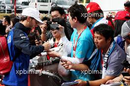 Pierre Gasly (FRA) Scuderia Toro Rosso signs autographs for the fans. 06.10.2018. Formula 1 World Championship, Rd 17, Japanese Grand Prix, Suzuka, Japan, Qualifying Day.