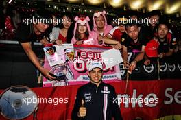 Esteban Ocon (FRA) Racing Point Force India F1 Team with the fans at night time. 06.10.2018. Formula 1 World Championship, Rd 17, Japanese Grand Prix, Suzuka, Japan, Qualifying Day.