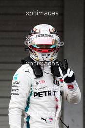 Lewis Hamilton (GBR) Mercedes AMG F1 celebrates his pole position in qualifying parc ferme. 06.10.2018. Formula 1 World Championship, Rd 17, Japanese Grand Prix, Suzuka, Japan, Qualifying Day.