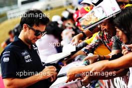 Sergio Perez (MEX) Racing Point Force India F1 Team signs autographs for the fans. 06.10.2018. Formula 1 World Championship, Rd 17, Japanese Grand Prix, Suzuka, Japan, Qualifying Day.