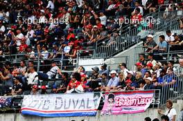 Esteban Ocon (FRA) Racing Point Force India F1 Team and Loic Duval (FRA) banners with fans in the grandstand. 06.10.2018. Formula 1 World Championship, Rd 17, Japanese Grand Prix, Suzuka, Japan, Qualifying Day.