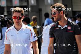 (L to R): Stoffel Vandoorne (BEL) McLaren with Romain Grosjean (FRA) Haas F1 Team on the drivers parade. 07.10.2018. Formula 1 World Championship, Rd 17, Japanese Grand Prix, Suzuka, Japan, Race Day.