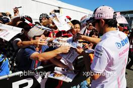 Sergio Perez (MEX) Racing Point Force India F1 Team signs autographs for the fans. 07.10.2018. Formula 1 World Championship, Rd 17, Japanese Grand Prix, Suzuka, Japan, Race Day.