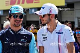 (L to R): Lance Stroll (CDN) Williams with Esteban Ocon (FRA) Racing Point Force India F1 Team on the drivers parade. 07.10.2018. Formula 1 World Championship, Rd 17, Japanese Grand Prix, Suzuka, Japan, Race Day.