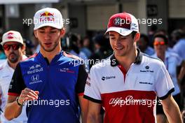 (L to R): Pierre Gasly (FRA) Scuderia Toro Rosso with Charles Leclerc (MON) Sauber F1 Team on the drivers parade. 07.10.2018. Formula 1 World Championship, Rd 17, Japanese Grand Prix, Suzuka, Japan, Race Day.