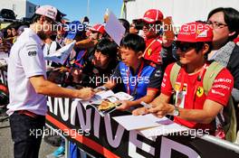 Sergio Perez (MEX) Racing Point Force India F1 Team signs autographs for the fans. 07.10.2018. Formula 1 World Championship, Rd 17, Japanese Grand Prix, Suzuka, Japan, Race Day.