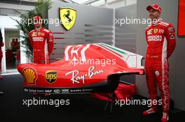 Kimi Raikkonen (FIN) Ferrari SF71H and Sebastian Vettel (GER) Ferrari SF71H. Ferrari and Phillip Morris launch Mission Minnow and a new logo. 04.10.2018. Formula 1 World Championship, Rd 17, Japanese Grand Prix, Suzuka, Japan, Preparation Day.