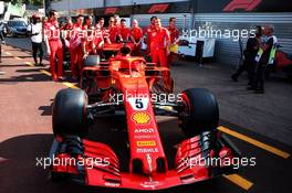 Sebastian Vettel (GER) Ferrari SF71H with tream members. 25.05.2018. Formula 1 World Championship, Rd 6, Monaco Grand Prix, Monte Carlo, Monaco, Friday.
