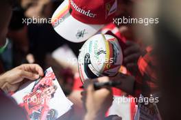 Sebastian Vettel (GER) Ferrari signs autographs for the fans. 25.05.2018. Formula 1 World Championship, Rd 6, Monaco Grand Prix, Monte Carlo, Monaco, Friday.