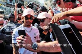 Lewis Hamilton (GBR) Mercedes AMG F1 with fans. 25.05.2018. Formula 1 World Championship, Rd 6, Monaco Grand Prix, Monte Carlo, Monaco, Friday.