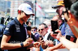 Esteban Ocon (FRA) Sahara Force India F1 Team signs autographs for the fans. 25.05.2018. Formula 1 World Championship, Rd 6, Monaco Grand Prix, Monte Carlo, Monaco, Friday.