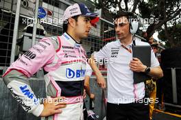 (L to R): Sergio Perez (MEX) Sahara Force India F1 with Tim Wright (GBR) Sahara Force India F1 Team Race Engineer on the grid. 27.05.2018. Formula 1 World Championship, Rd 6, Monaco Grand Prix, Monte Carlo, Monaco, Race Day.
