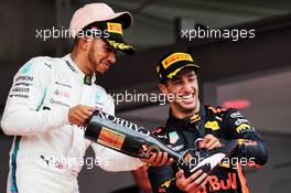 (L to R): Lewis Hamilton (GBR) Mercedes AMG F1 celebrates on the podium with race winner Daniel Ricciardo (AUS) Red Bull Racing. 27.05.2018. Formula 1 World Championship, Rd 6, Monaco Grand Prix, Monte Carlo, Monaco, Race Day.