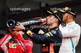 Race winner Daniel Ricciardo (AUS) Red Bull Racing celebrates on the podium with Lewis Hamilton (GBR) Mercedes AMG F1 and Sebastian Vettel (GER) Ferrari. 27.05.2018. Formula 1 World Championship, Rd 6, Monaco Grand Prix, Monte Carlo, Monaco, Race Day.