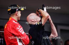 Adrian Newey (GBR) Red Bull Racing Chief Technical Officer celebrates on the podium with Sebastian Vettel (GER) Ferrari. 27.05.2018. Formula 1 World Championship, Rd 6, Monaco Grand Prix, Monte Carlo, Monaco, Race Day.