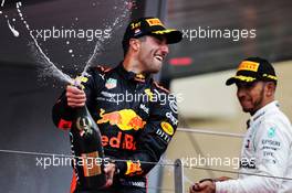 Race winner Daniel Ricciardo (AUS) Red Bull Racing celebrates on the podium with Lewis Hamilton (GBR) Mercedes AMG F1. 27.05.2018. Formula 1 World Championship, Rd 6, Monaco Grand Prix, Monte Carlo, Monaco, Race Day.