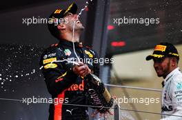 Race winner Daniel Ricciardo (AUS) Red Bull Racing celebrates on the podium with Lewis Hamilton (GBR) Mercedes AMG F1. 27.05.2018. Formula 1 World Championship, Rd 6, Monaco Grand Prix, Monte Carlo, Monaco, Race Day.