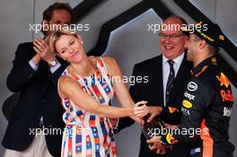 (L to R): Princess Charlene of Monaco celebrates on the podium with HSH Prince Albert of Monaco (MON) and Adrian Newey (GBR) Red Bull Racing Chief Technical Officer. 27.05.2018. Formula 1 World Championship, Rd 6, Monaco Grand Prix, Monte Carlo, Monaco, Race Day.