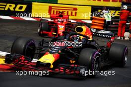 Daniel Ricciardo (AUS) Red Bull Racing RB14 leads Sebastian Vettel (GER) Ferrari SF71H. 27.05.2018. Formula 1 World Championship, Rd 6, Monaco Grand Prix, Monte Carlo, Monaco, Race Day.