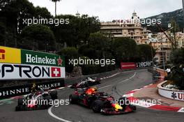 Max Verstappen (NLD) Red Bull Racing RB14 and Kevin Magnussen (DEN) Haas VF-18. 27.05.2018. Formula 1 World Championship, Rd 6, Monaco Grand Prix, Monte Carlo, Monaco, Race Day.